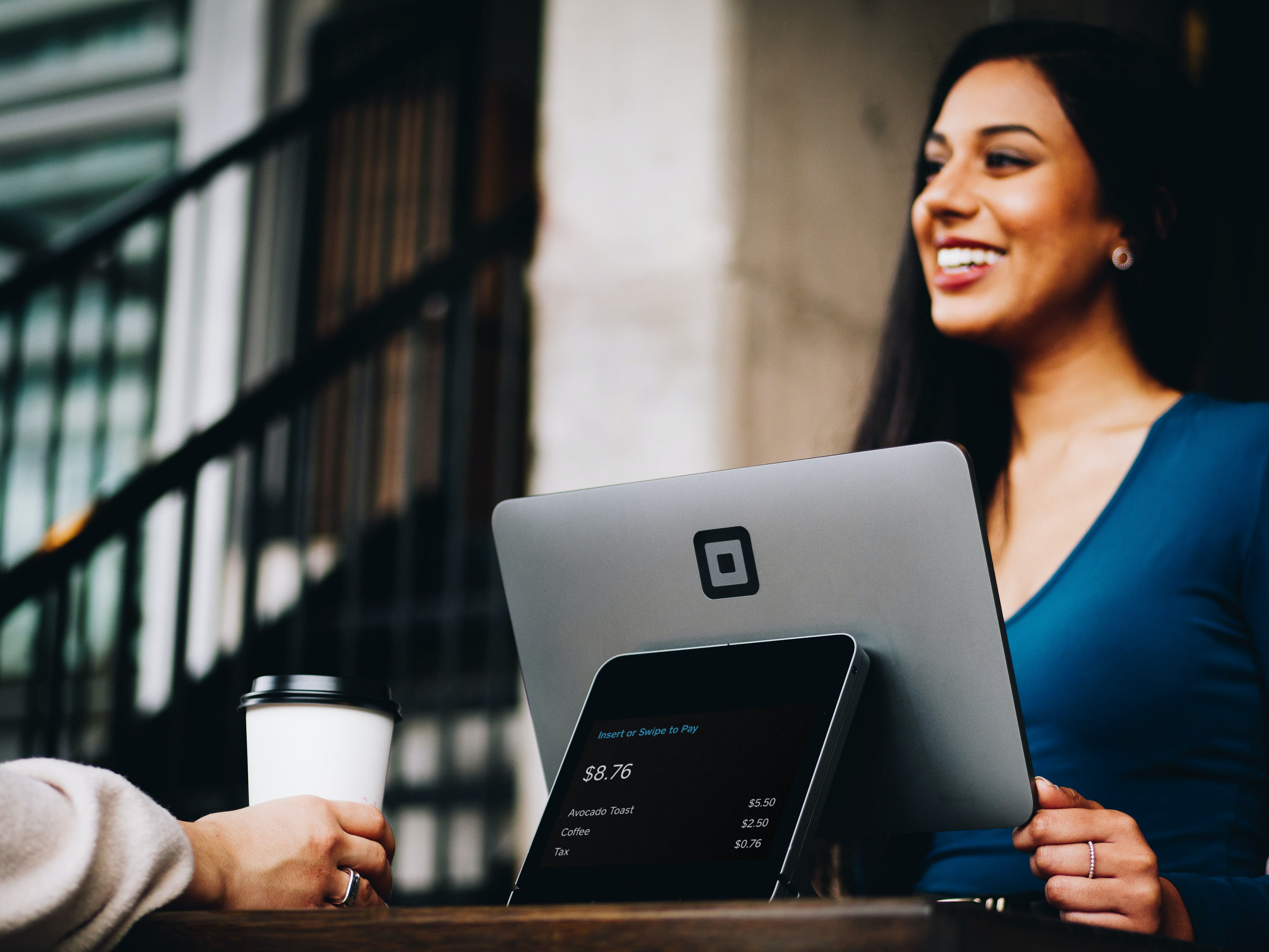 Girl is smiling working on computer